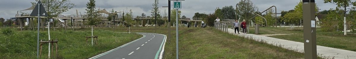 Ein langer, gut ausgebauter Radweg zwischen Zwingenberg und Heppenheim, eingebettet in eine grüne Landschaft